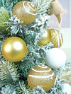 2 Ft. Gold Swirl Frosty Bushy Christmas Tree Filled With Balls And Ornament Fillers