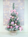 2 Ft. Pastel Pink Swirl Snowy Bushy Christmas Tree Filled With Balls And Ornament Fillers