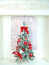 2 Ft. Red Swirl Frosty Bushy Christmas Tree Filled With Balls And Ornament Fillers