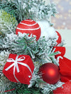2 Ft. Red Swirl Frosty Bushy Christmas Tree Filled With Balls And Ornament Fillers