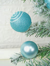 3 Ft. Pastel Blue Swirl Snowy Bushy Christmas Tree Filled With Ball Ornament And Fillers