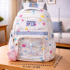 White Multicolor Star Print with Front Bungee Pocket Backpack with Detachable Plush Star Keychain & Star Pins