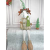 Grey Sitting Long Legs Reindeer With Ski Boards