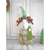 Grey Sitting Long Legs Reindeer With Ski Boards